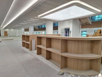 The lower bookshelves on Level 6 are planned to host oversize books. Renovation photo