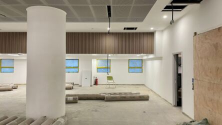 Nordic style striped wooden panels and mesh ceiling on Level 6. Renovation photo
